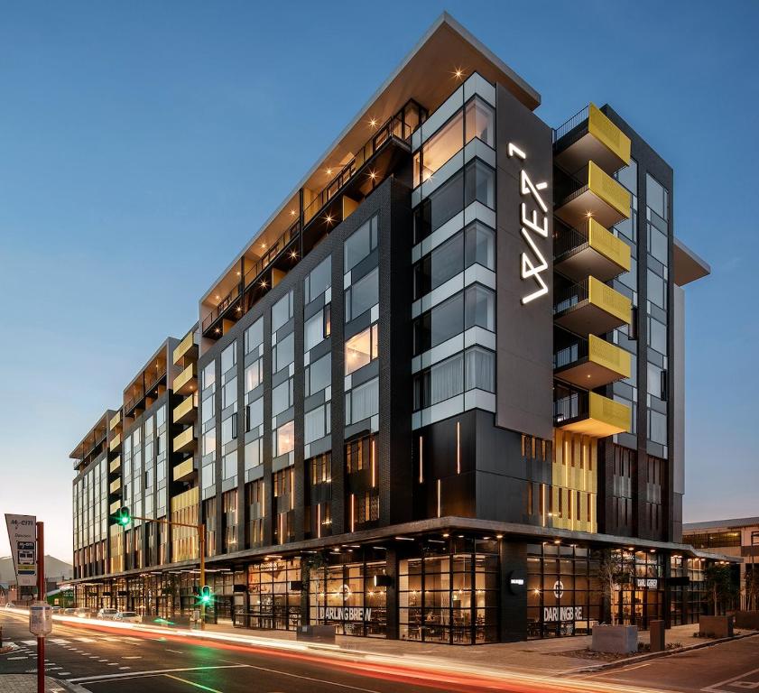 a tall black building with a sign on it at Apartment with Mountain views Wex1 in Cape Town