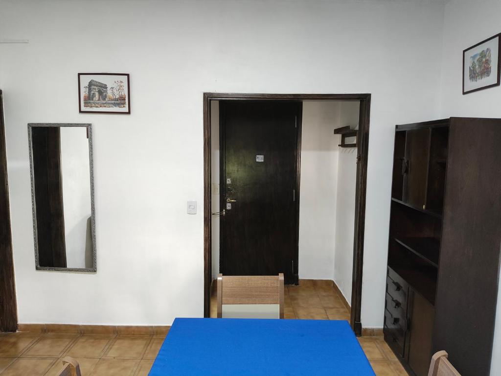 En eller flere senge i et værelse på Departamento céntrico