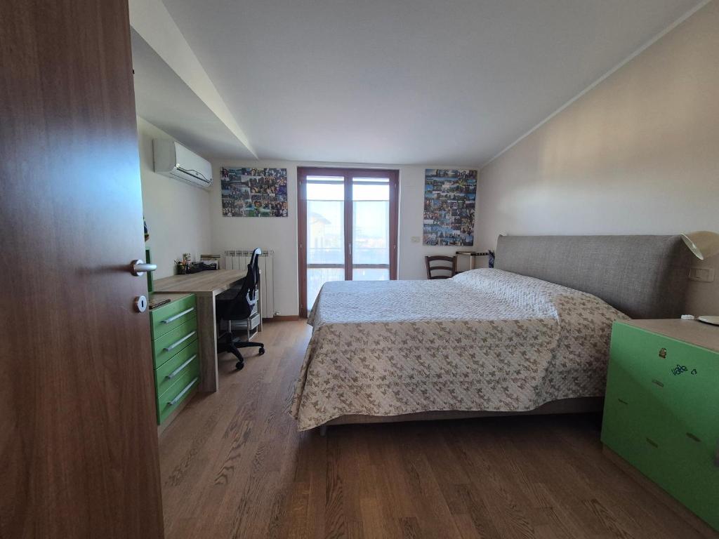 Ένα ή περισσότερα κρεβάτια σε δωμάτιο στο Casa Joy