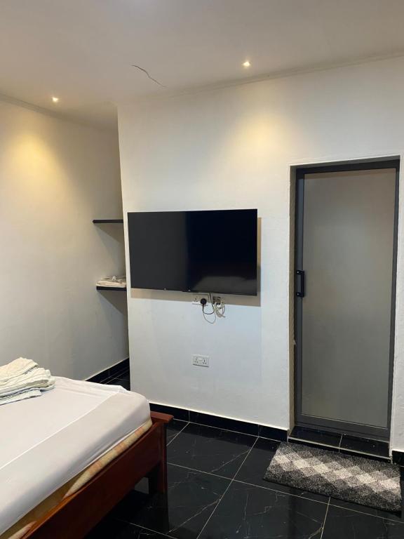 TV a/nebo společenská místnost v ubytování Ma Passion