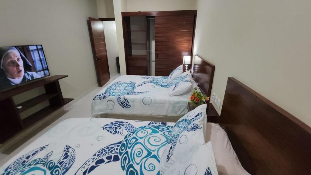 Ένα ή περισσότερα κρεβάτια σε δωμάτιο στο Bungalows Butterfly - Mariposa