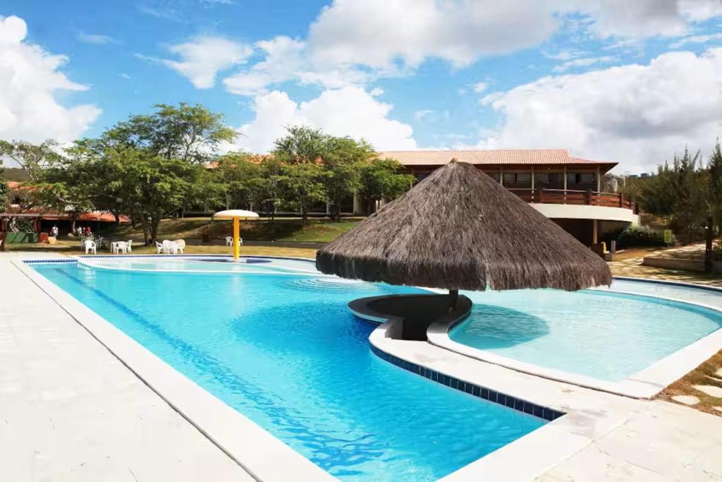 Πισίνα στο ή κοντά στο Monte Castelo Flat Temporada