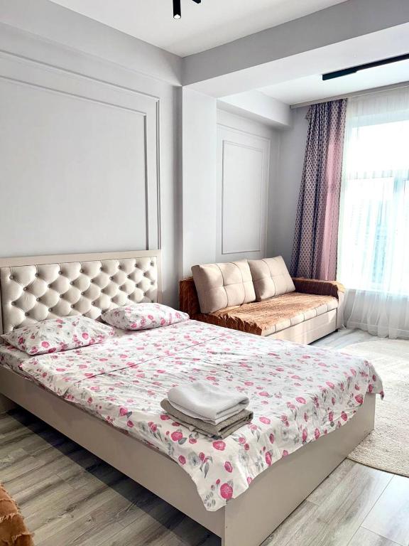 Llit o llits en una habitació de Action Djal