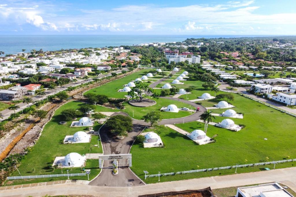 an aerial view of a park with tents at Bubble Glamping 2 King beds, we have a 12 units like this in Laguna del Higüero