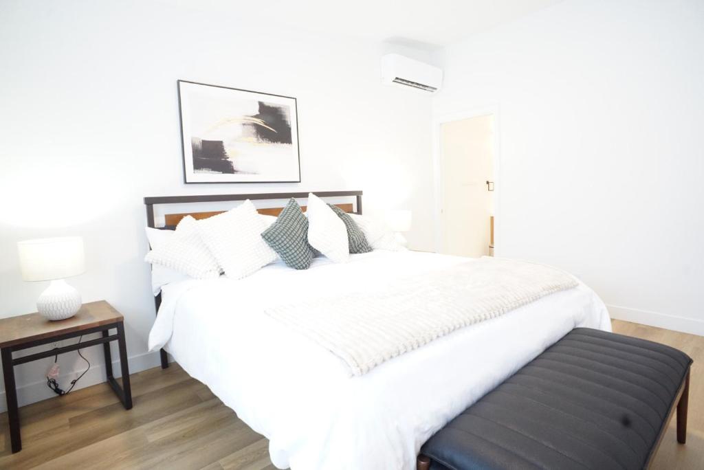 Un pat sau paturi într-o cameră la Loup