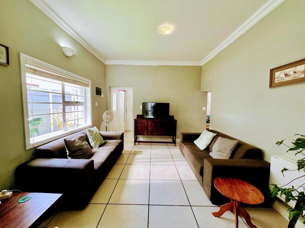 Posezení v ubytování Grey Pearl at Strand