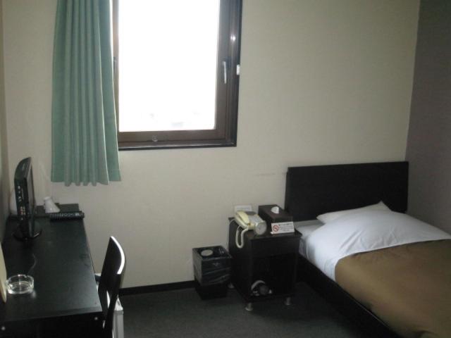 TV a/nebo společenská místnost v ubytování Sakura Hotel Oami