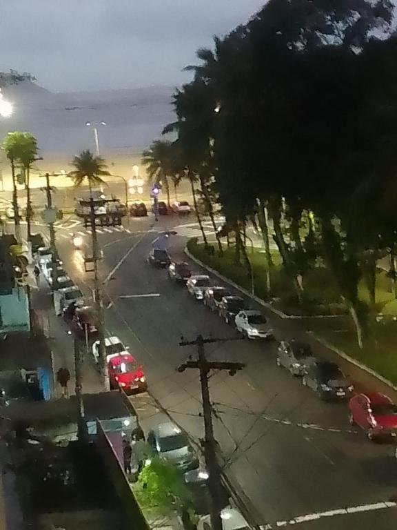 an aerial view of a parking lot with cars at Apto 2 dorm com elevador in São Vicente
