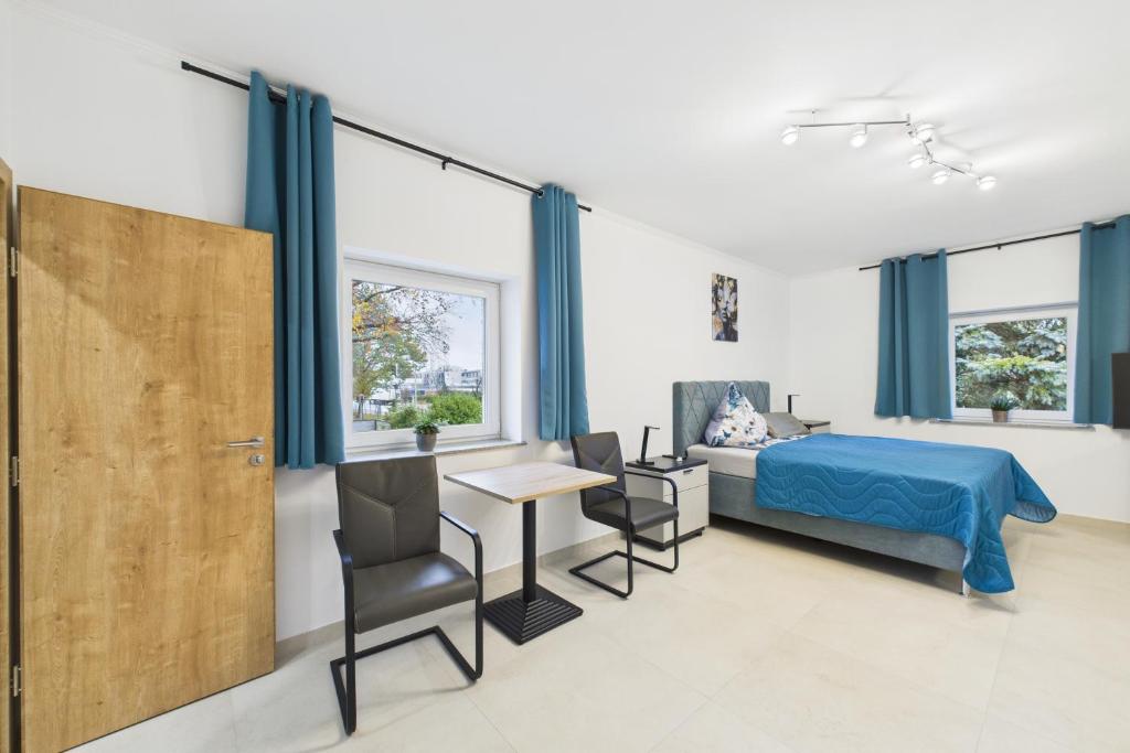 Ένα ή περισσότερα κρεβάτια σε δωμάτιο στο Attraktive Neubau Bei Zwei Buchen