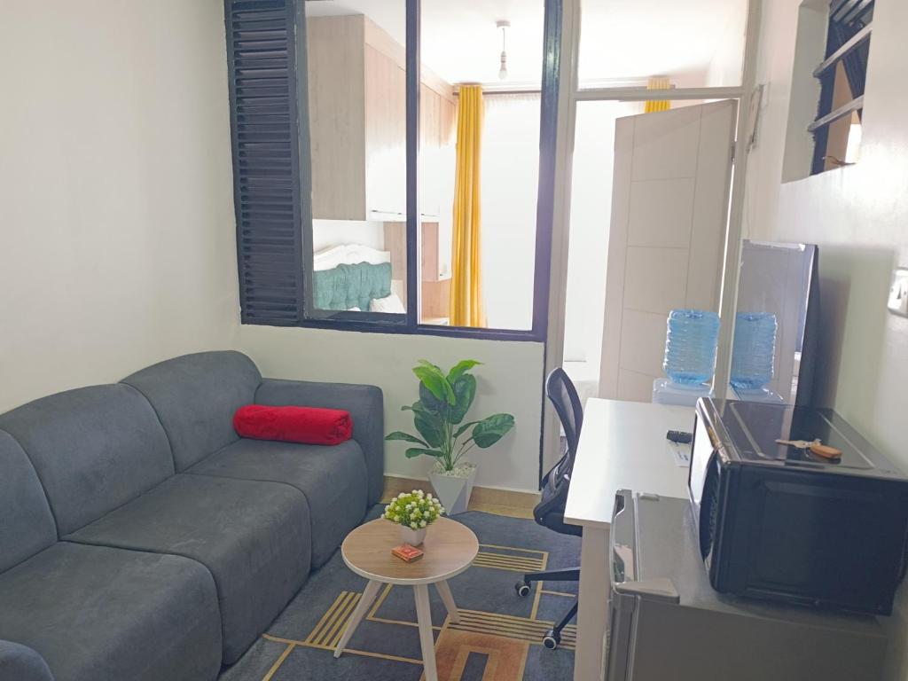 Posezení v ubytování Executive Studio Kinoo