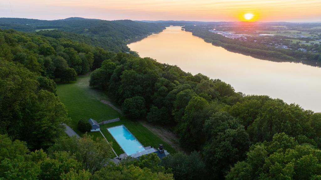 an aerial view of a river with a swimming pool at Pool Cottage at Roundtop Estate couples oasis in Wrightsville