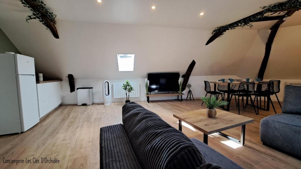 Posezení v ubytování O' Clocher Tors