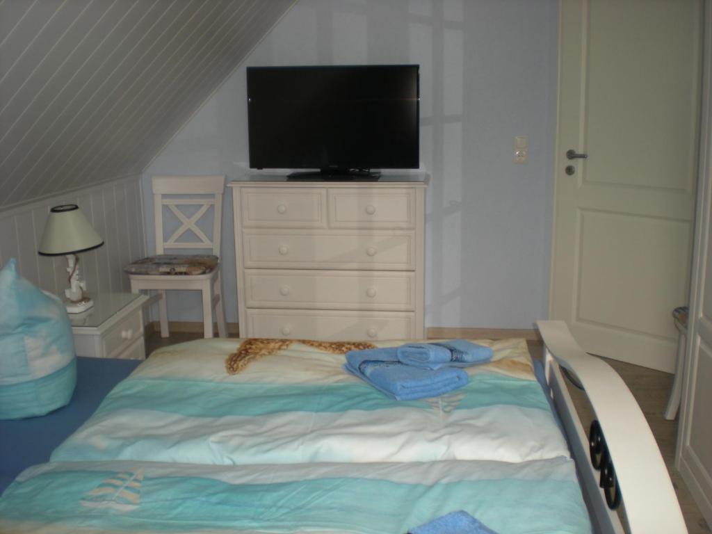 Postel nebo postele na pokoji v ubytování Ferienhaus Arielle