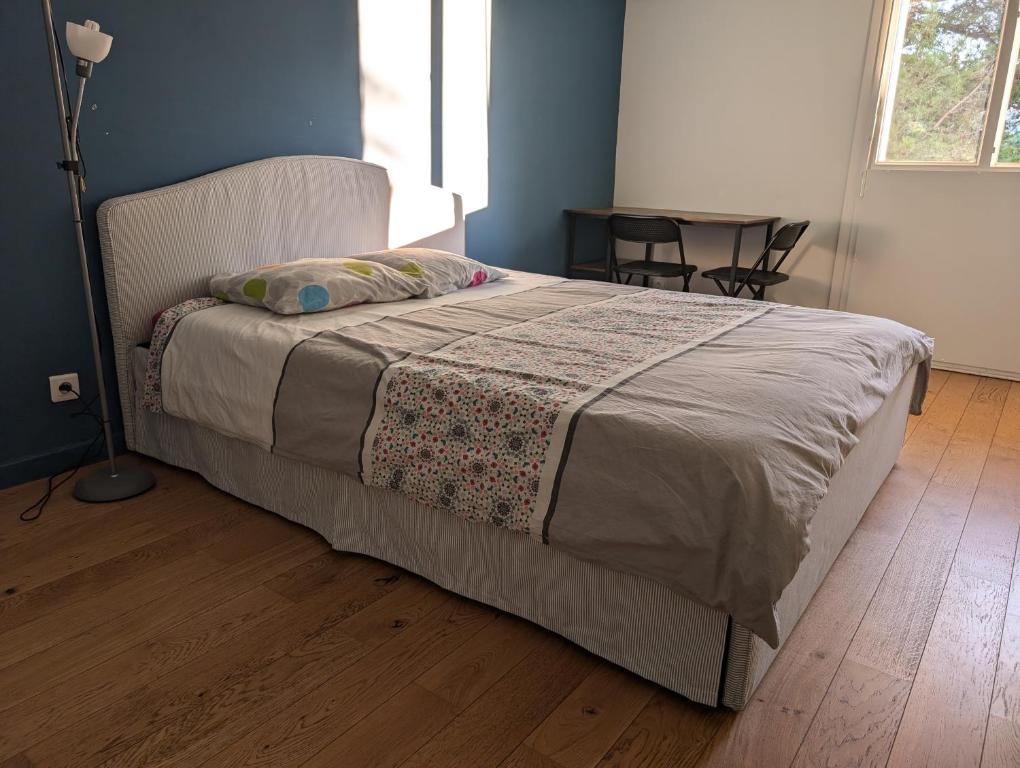 Postel nebo postele na pokoji v ubytování Chez Nicolas Marseille 13009