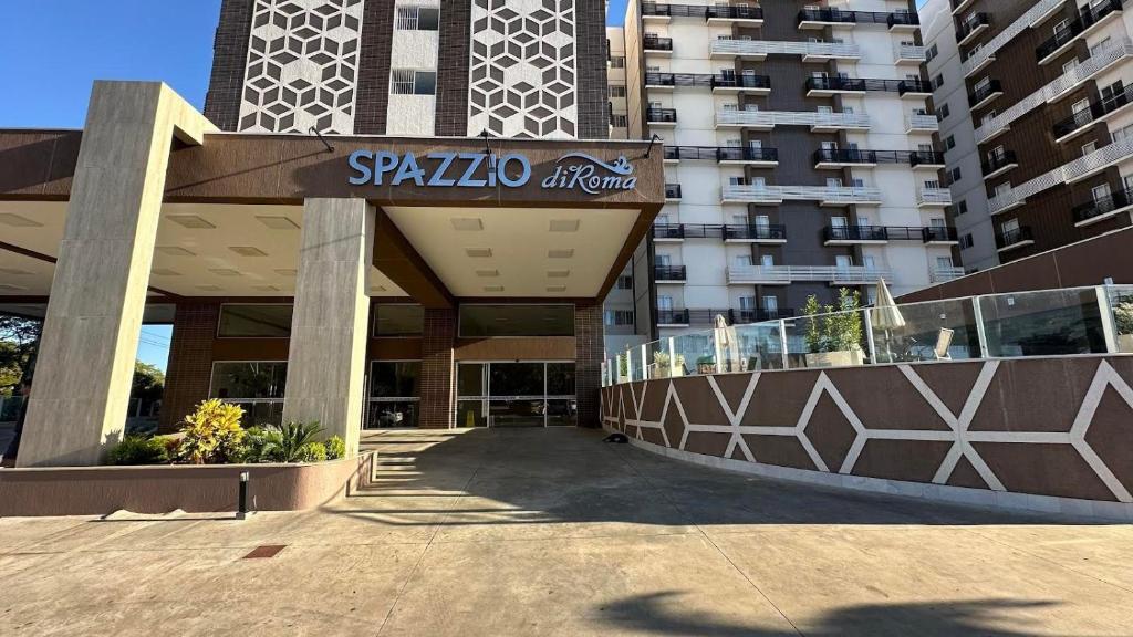 卡达斯诺瓦斯Flats Spazzio diRoma acesso ao Acqua Park的一栋带有“Spielo Apartment”标志的建筑