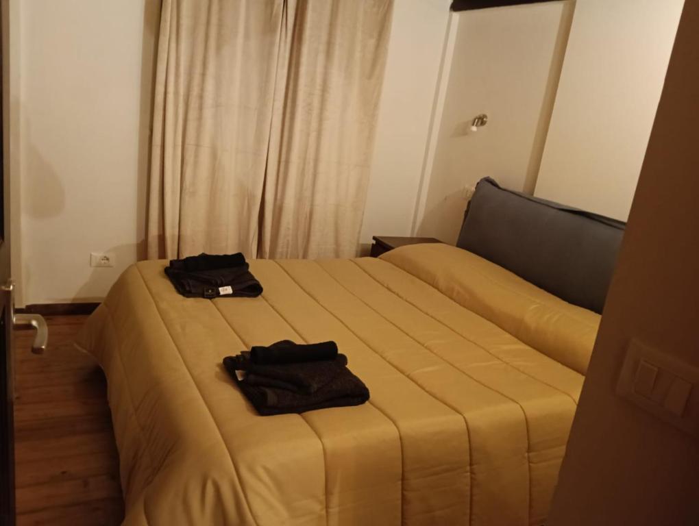 En eller flere senge i et værelse på Mary's house