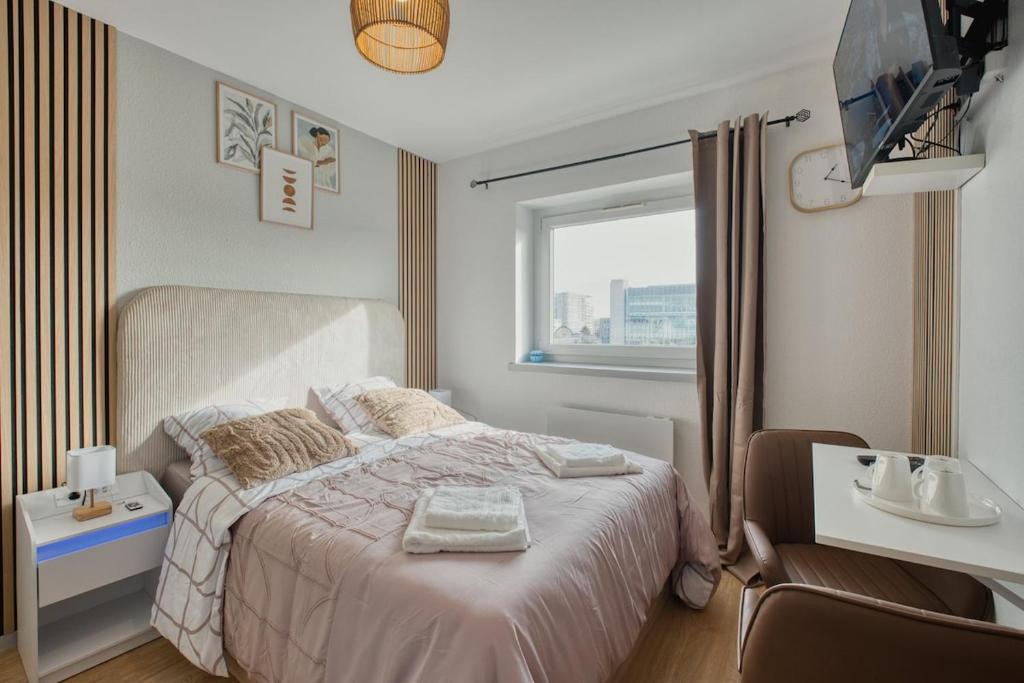 Llit o llits en una habitació de Avenue Foch