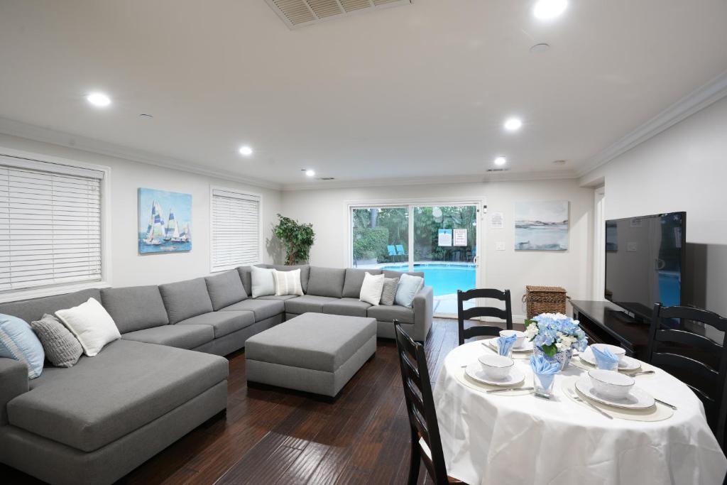 a living room with a couch and a table at Destination #06 in Anaheim