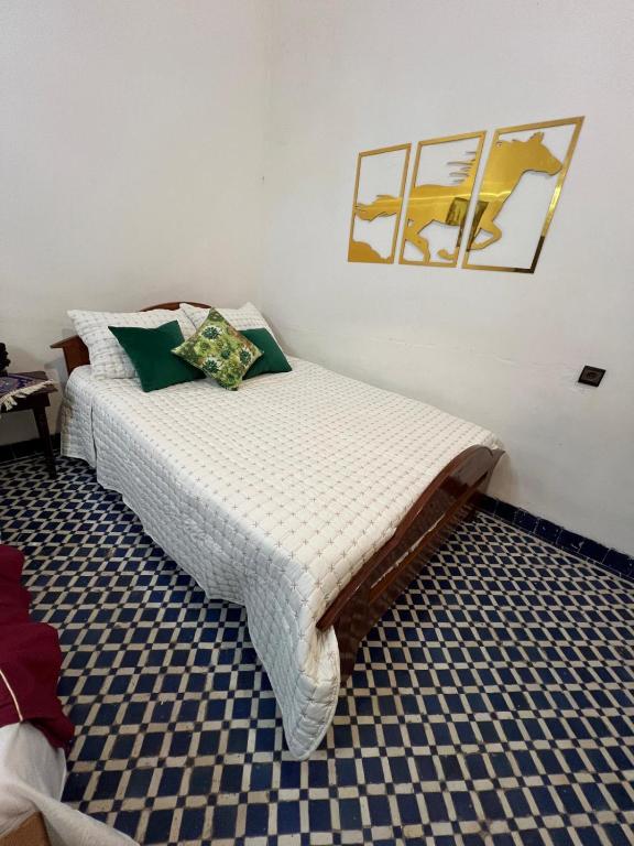 Postel nebo postele na pokoji v ubytování Riad Dar Babouche