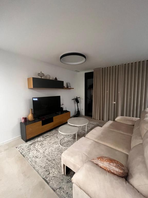 Khu vực ghế ngồi tại Kristiansand Apartament