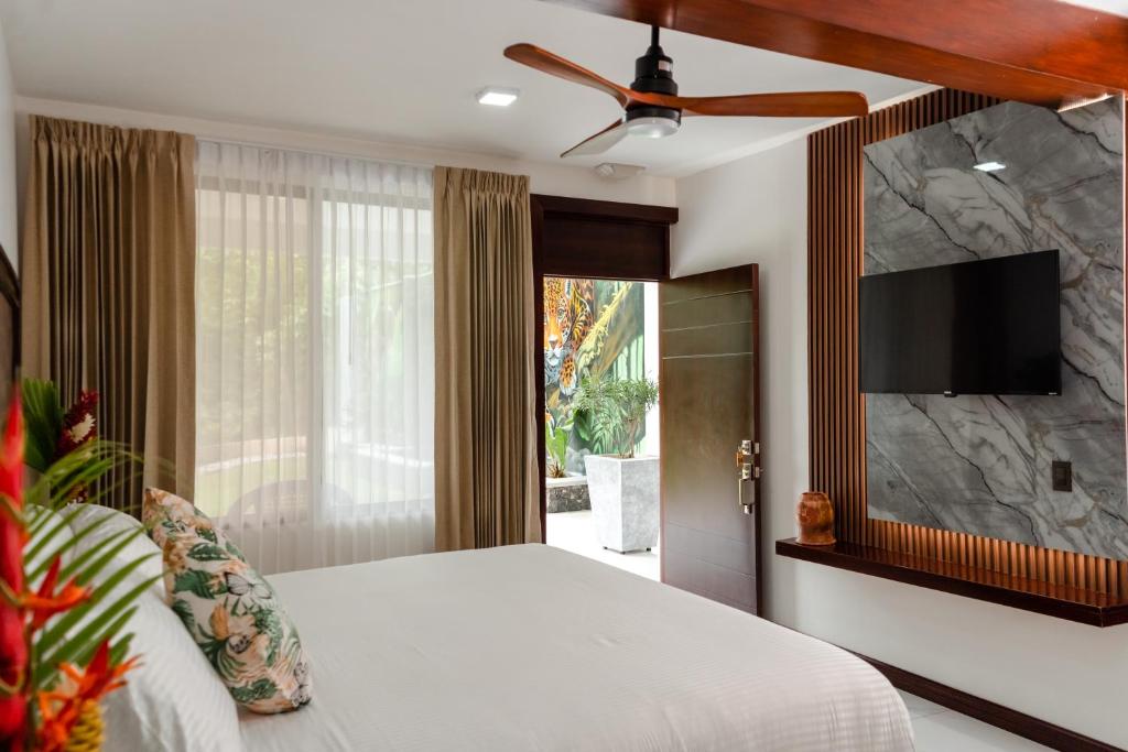 Ένα ή περισσότερα κρεβάτια σε δωμάτιο στο Hotel Sanctuarium