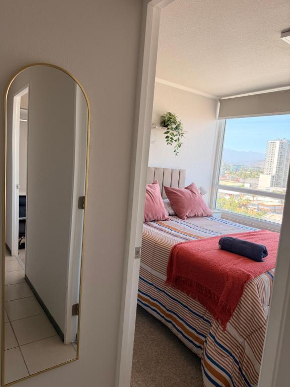 Ένα ή περισσότερα κρεβάτια σε δωμάτιο στο Departamento rancagua centro nuevo