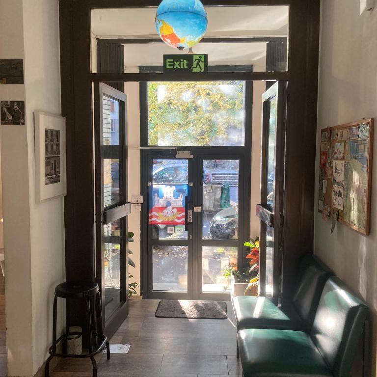 an entrance to a building with a glass door at Chillton hostel in Belgrade