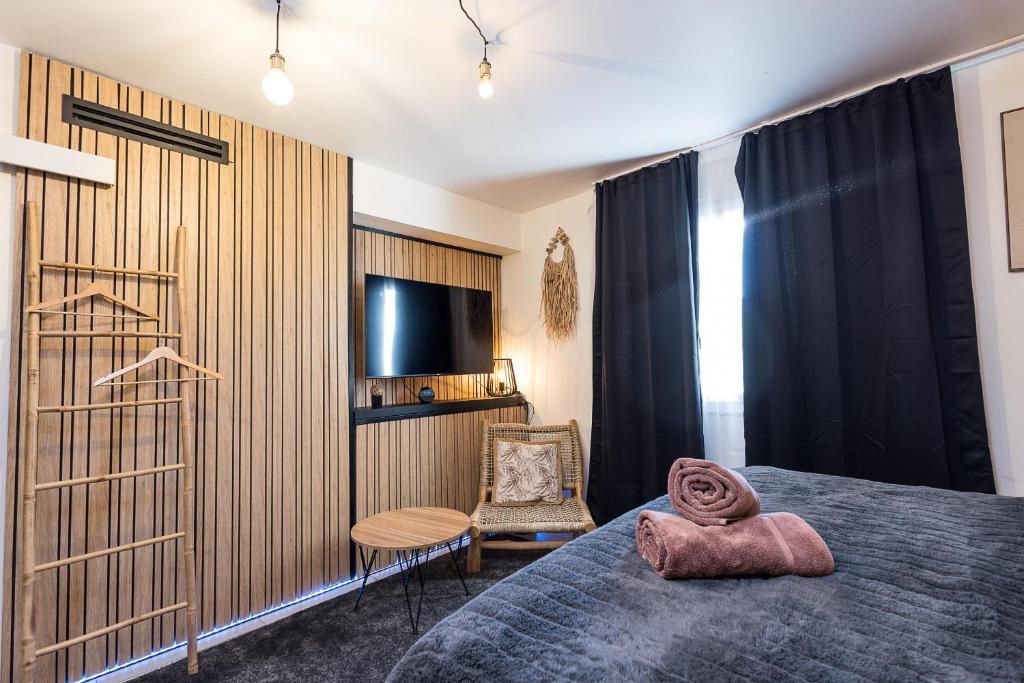 Postel nebo postele na pokoji v ubytování Loresentiel