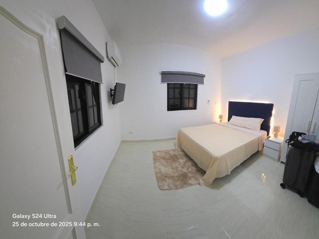 Postel nebo postele na pokoji v ubytování Playa las Canas