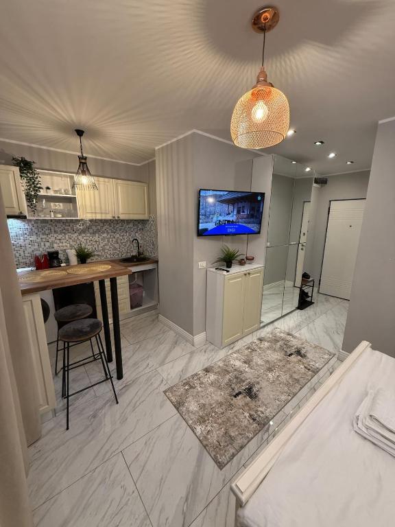 Η κουζίνα ή μικρή κουζίνα στο Quiet OldTown Sudio