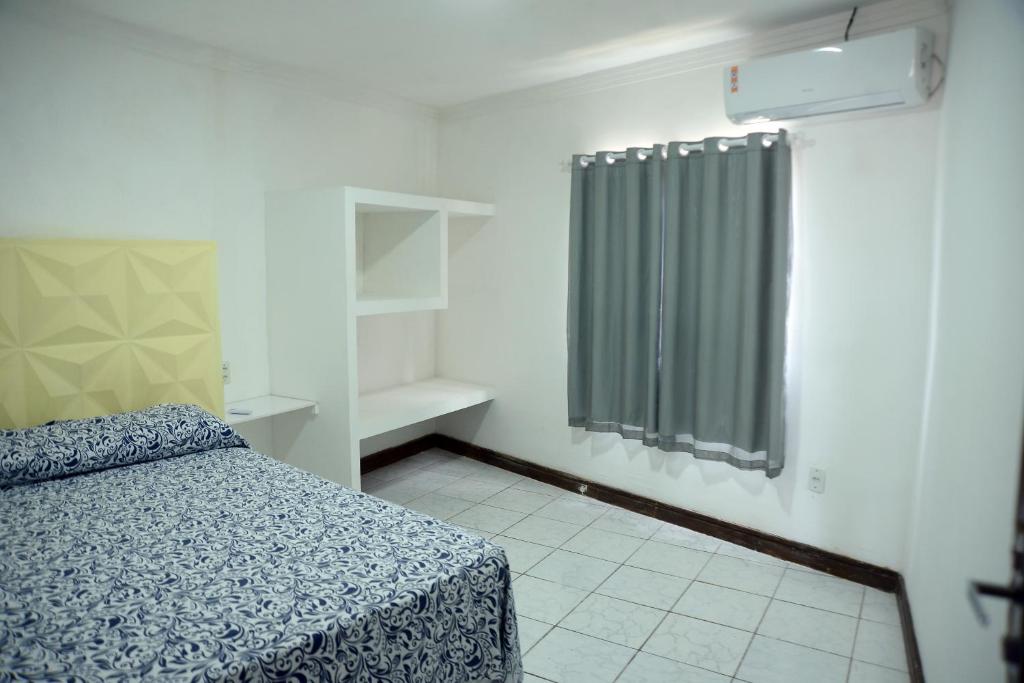 Voodi või voodid majutusasutuse pousada Gransouza quarto de casal 07 toas