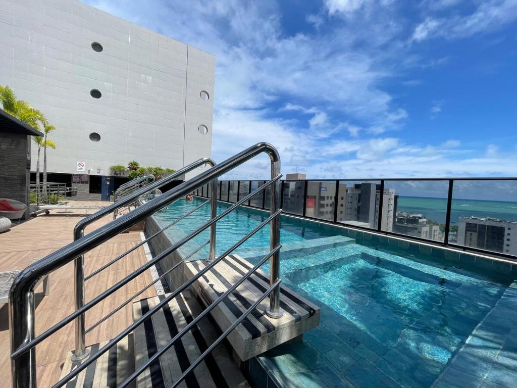 La alberca dentro o cerca de Apartamento quarto e sala Edifício Time - 1105