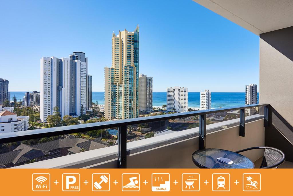 a balcony with a view of the ocean and buildings at Ruby Gold Coast By Serain in Gold Coast