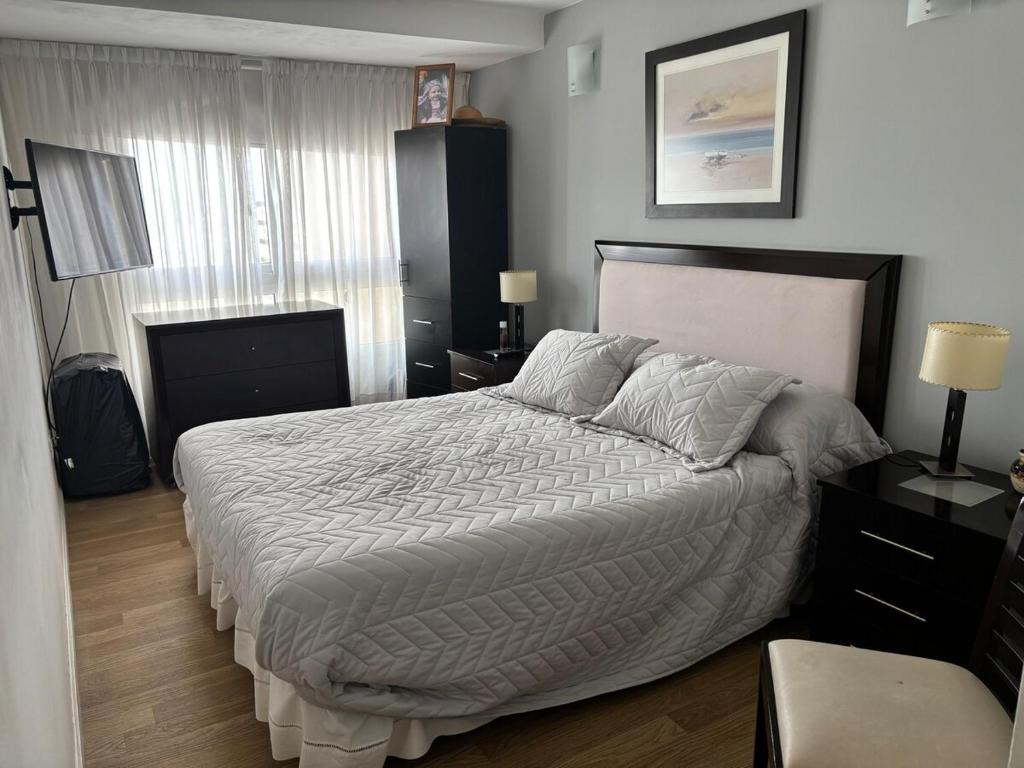 Ένα ή περισσότερα κρεβάτια σε δωμάτιο στο Departamento impecable 2 ambientes