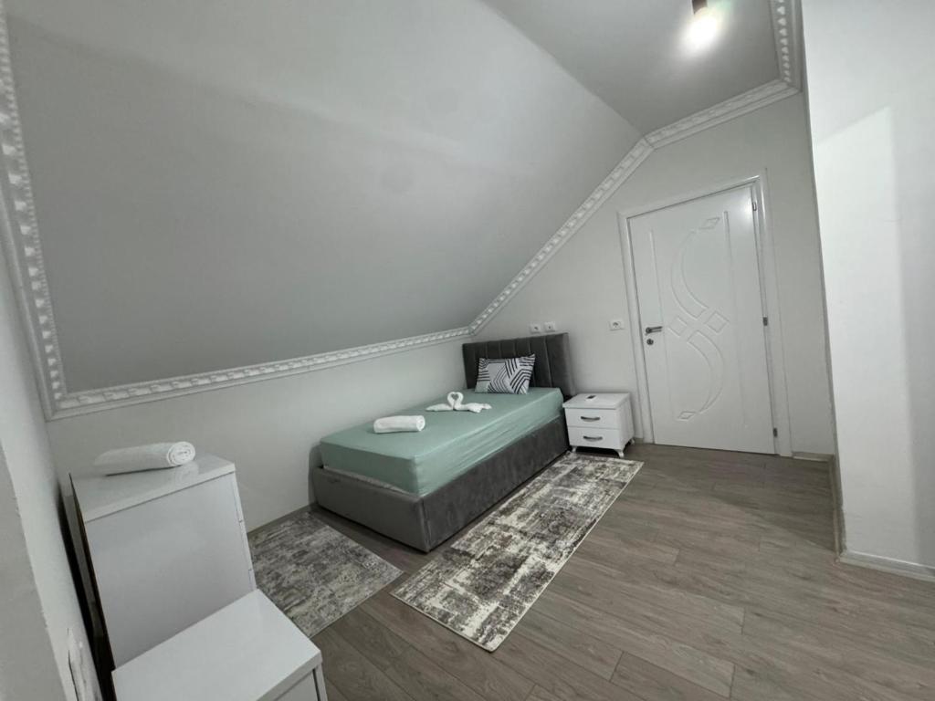 Ένα ή περισσότερα κρεβάτια σε δωμάτιο στο IK Villa