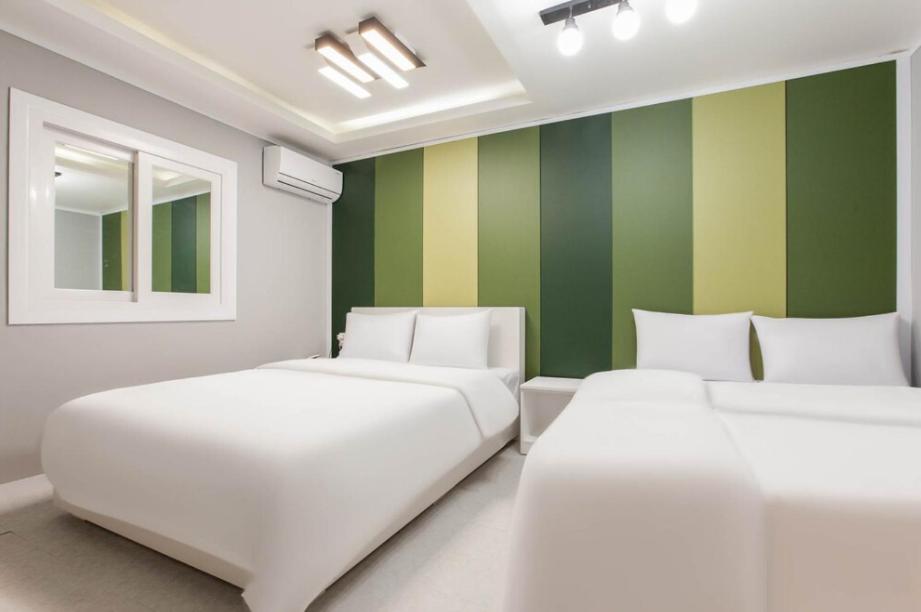 Ένα ή περισσότερα κρεβάτια σε δωμάτιο στο Social Stay