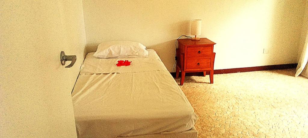 Ένα ή περισσότερα κρεβάτια σε δωμάτιο στο Tropicana Villa