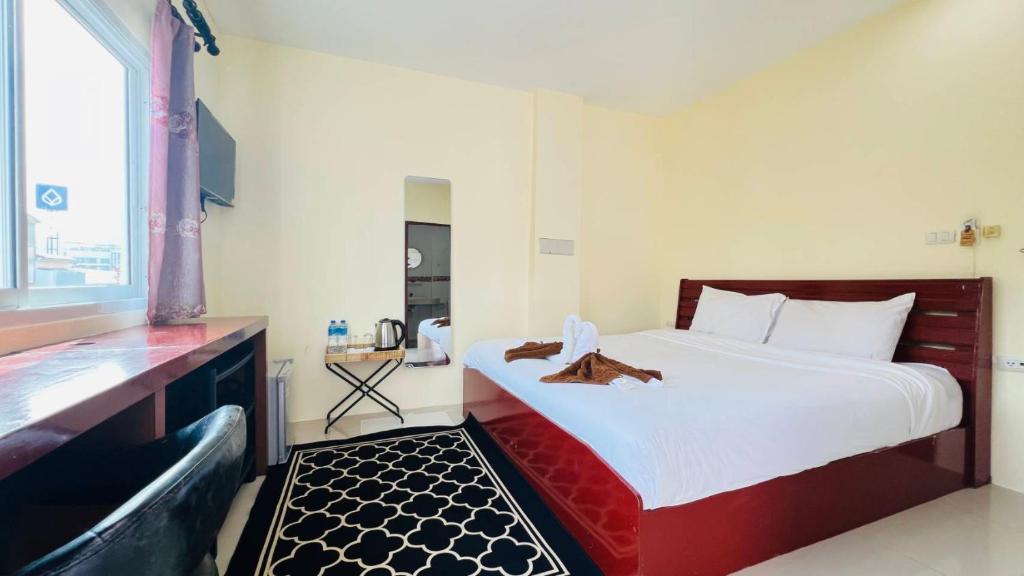 Ένα ή περισσότερα κρεβάτια σε δωμάτιο στο Jasmin Guest House