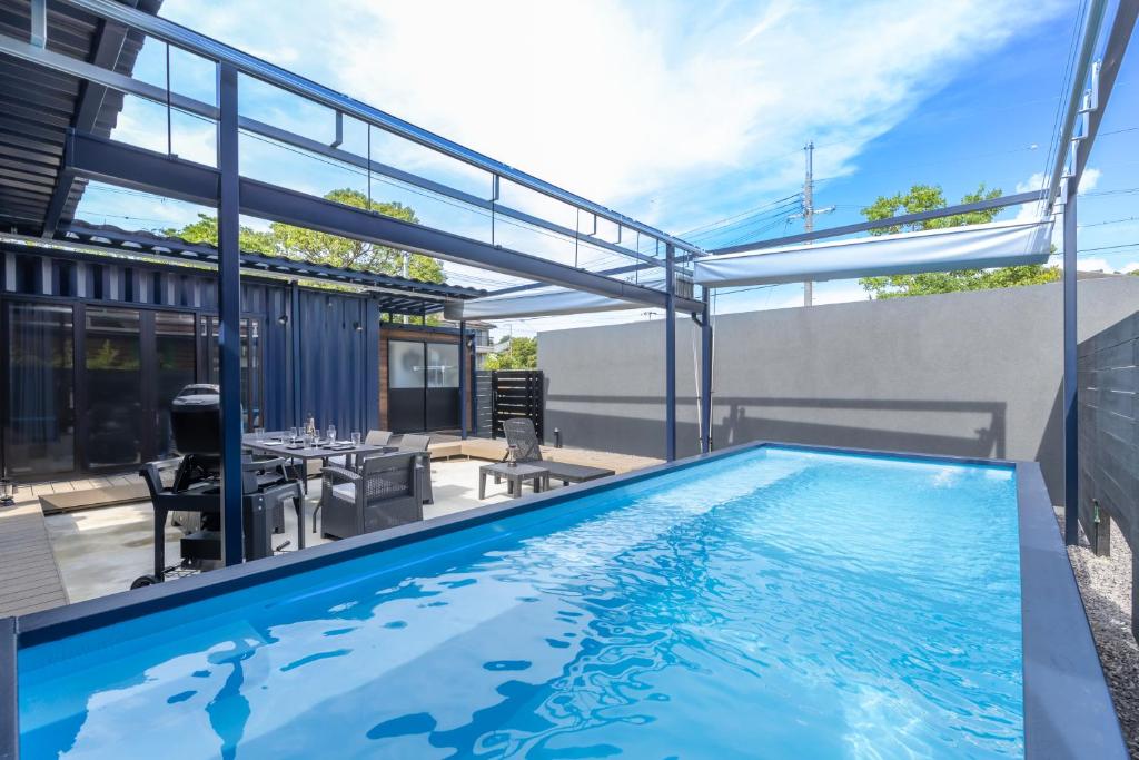 a swimming pool on the roof of a building at 淡路島 Villa Paddle - Self Check-In Only in Sumoto