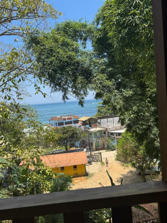 a view of the ocean from a house at Bela vista in Paraty