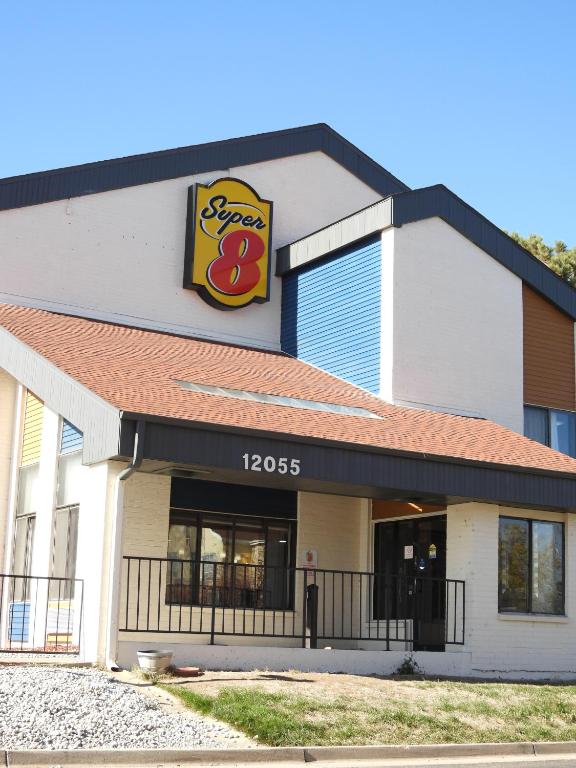 a fast food building with a sign on it at Super 8 by Wyndham Westminster Denver North in Westminster