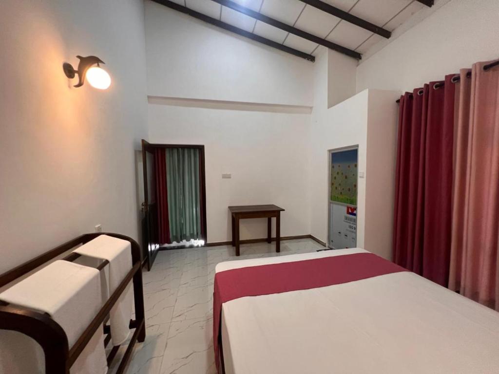 Postel nebo postele na pokoji v ubytování Mingu villa