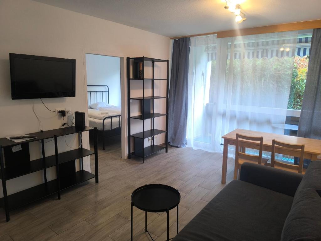 Un televizor și/sau centru de divertisment la Alpen Home Kaprun