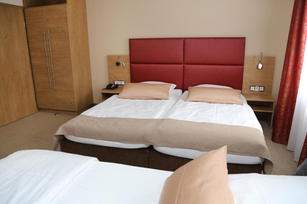 Postel nebo postele na pokoji v ubytování Hotel Lindleinsmühle