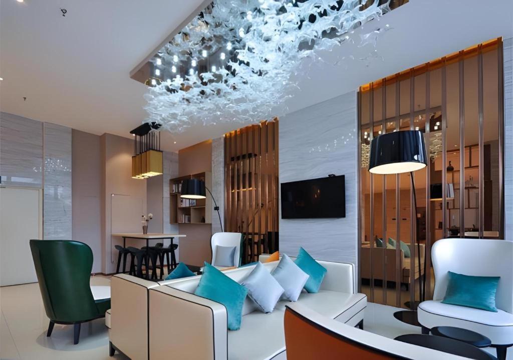 TV a/nebo společenská místnost v ubytování City Comfort Inn Nanning Xingning District Government Maternal and Child Health Hospital