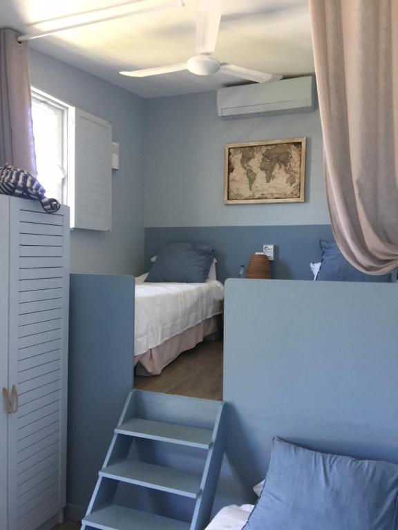 Ένα ή περισσότερα κρεβάτια σε δωμάτιο στο Obleu villa