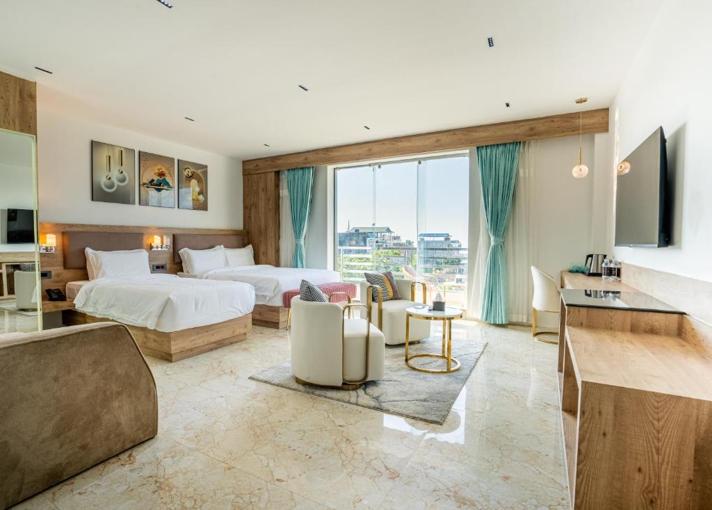 Ένα ή περισσότερα κρεβάτια σε δωμάτιο στο Hotel Meriken