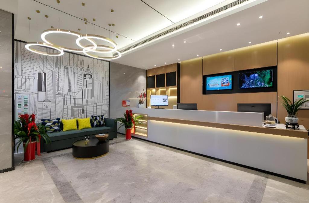 TV a/nebo společenská místnost v ubytování City Comfort Inn Wuhan Jindi Plaza Luojiagang Metro Station