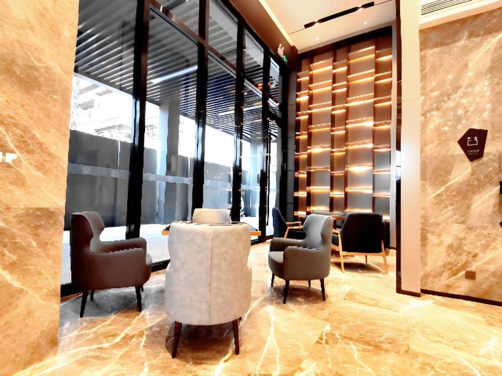 Χώρος καθιστικού στο Echarm Hotel Wuhan Gaotie Jianshe 2nd Road Metro Exit