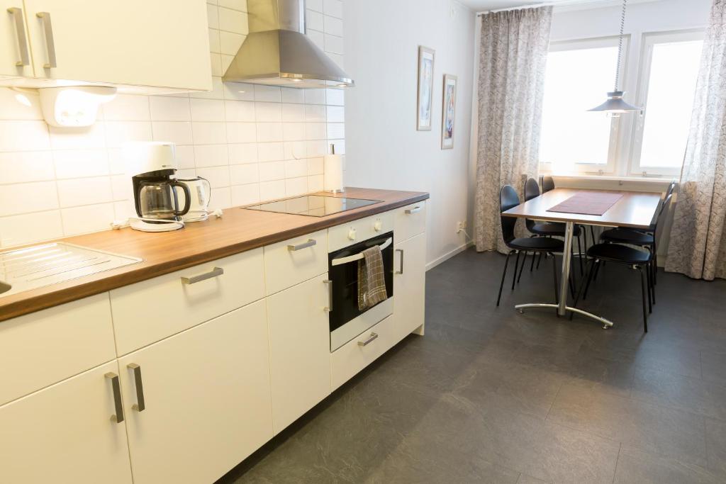 Kuchyň nebo kuchyňský kout v ubytování Simloc Hotel Drottninggatan